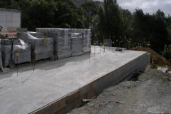 The floor is finished and ready for blockwork.