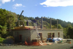 Steel uprights in place with walls off to one side.