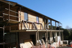 The front sun porch being framed.