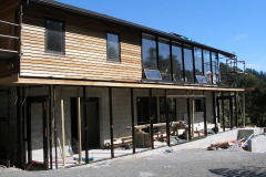 The front sun porch being framed and ready for glazing.