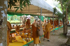 Monks preparing for the meal as part of the celebrations over several days at Wat PahAmpawan in Chonburi Thailand.