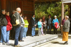 Ajahn Kusalo chatting with a group of visitors from St. Francis Xavier church.