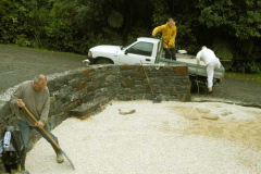 The final layer of white stone being added to the kitchen garden.