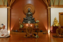 Anagarika Colin takes his place with the Sangha.