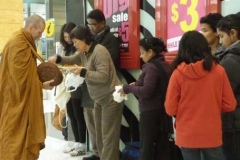 Alms round in the Palmerston North shopping mall.