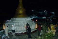 Circumambulation of the stupa under the full moon of Vesak. The incense the candles the lights of Stokes Valley in the distance. Nice.