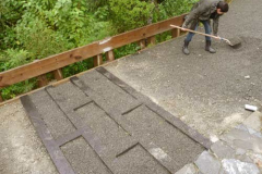 Natalie fills in the interstices between the new drive-courtyard transition grid.