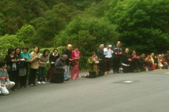 Friends lined up outside the monastery entrance on New Years morning to offer alms to the Sangha.