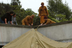 Days before the event sangha and friends erect the marquee over the cloister.