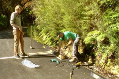 John and Benjamin fixing the wheel stops in the upper car park.