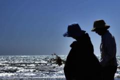 Suan and Patsy silhouetted against the bright summer sky.