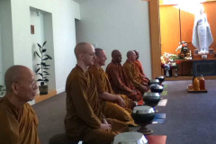 Bhante Sugatavamsa (nearest Buddha) joins us for dana and a week-long self retreat at Bodhinyanarama.