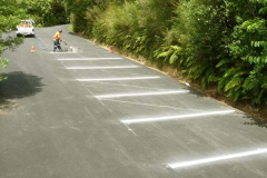 The carpark gets some white stripes.