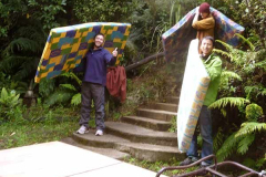 Mattresses from the upper house make their way down to the recently cleared space in the Dhamma sala to make way for stuff from the kitchen store to make way for the new office.