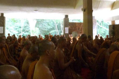 About half of the monks gathered in the assembly hall to mark Ajahn Chahs birthday. There were many hundreds more monks outside as well as a large crowd of lay people. Very inspiring.