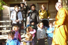 Kids from the Stokes Valley playcenter meet a monk for the first time.