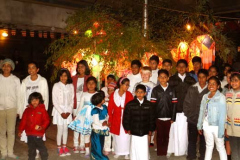 Kids from the Tawa dhamma school stand infront of their Vesak lanterns. A bright lot indeed - kids and lanterns.