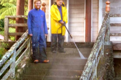 David and Leslie (with hose) putting some time into cleaning the concrete work around the sala.
