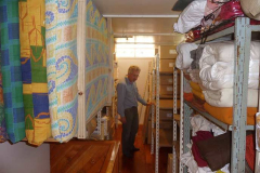 The back sala store room. Lots more space for books and bedding.