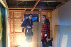 John and Finn working late to get the new kutis finished.
