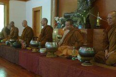 The Sangha assembled ready to begin the Magha puja ceremonies.