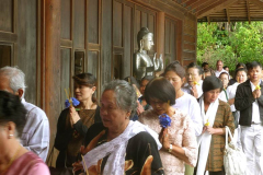 Chanting "Itipi so... " we file through the cloister.