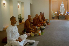The Sangha silently reflecting at meal time.