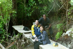 Earl Eve and Marcello working on fixing the meditation walking path deck.