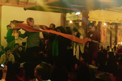 The monastery committee carry the robe cloth as a collective offering to the sangha.