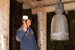 James delivers twelve hearty blows to the bell to ring in the new year.