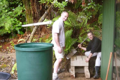 Benni and Craig put finishing touches to the water tank stand at one of the new kutis. And isnt it wonderful that we have all this rain? Hah!