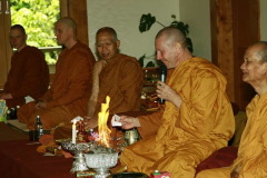 The Sangha chants "Anicca vata sankhara..." while the names of departed loved ones are burnt. May they realise nibbana.