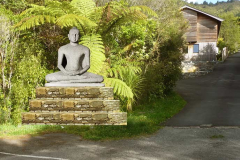 The entrance to the monastery with a photo projection of a large Buddha image. There are many choices to be made as to the final.