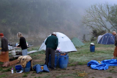 Breaking camp at Ohinepane. We are all still quite unfamiliar with our barrel storage system and it takes a long time to pack.