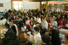 We gather back in the hall after lunch and prepare to make offerings.