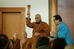 Bhante Jinalankara offers a water blessing to all.