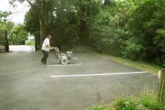 Tony putting the finishing touch to the entrance car park.