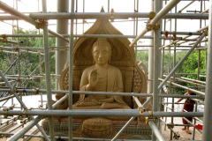 The new stone Buddha rupa on the second level of Ajahn Aneks new uposatha hall.