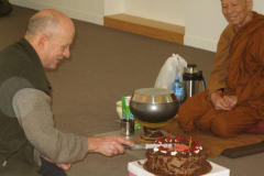 Bruce cuts a 65 year old cake - him not the cake. Another milestone another day another dana... one step closer to nibbana!