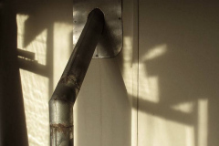 Soft shadows on the kuti wall.