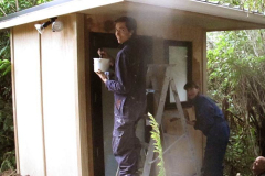 Sebastian and Anna begin painting the new monks toilet.
