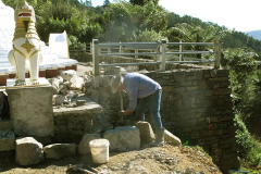 Gavin begins work on the northern arc of the forecourt wall.