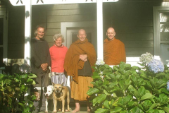 Old friends of Ajahn Kusalo. Al has managed the farm for decades. Pauline was visiting for a few days. The dogs were waiting for pigs. The monks had not long had tea.