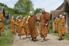 Leaving the dhamma hall.