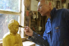 Pat puts the final touches to the "Rupa on a Rock".