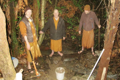 Excavating debris and generally restoring the sauna pond.