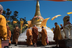 Offerings are made at the stupa after the circumambulation.
