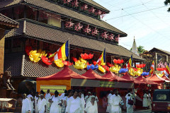 Lights and lanterns and so many people in white. There is a pervasive feeling of celebration.