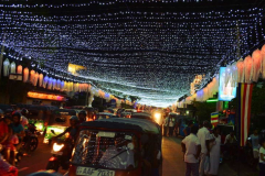 TukTuks thread their way through the congested streets. At least the way is well lit.