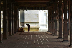 The very back of the temple. A few monks meet to chat.
